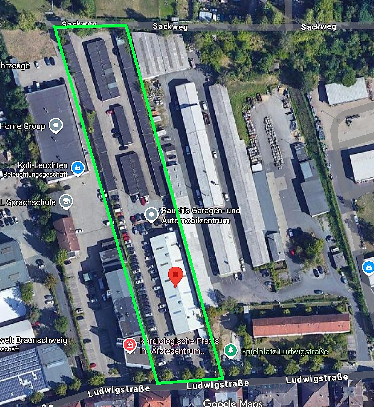 Luftbild des Rauch Garagenhofs mit grün markiertem Gelände